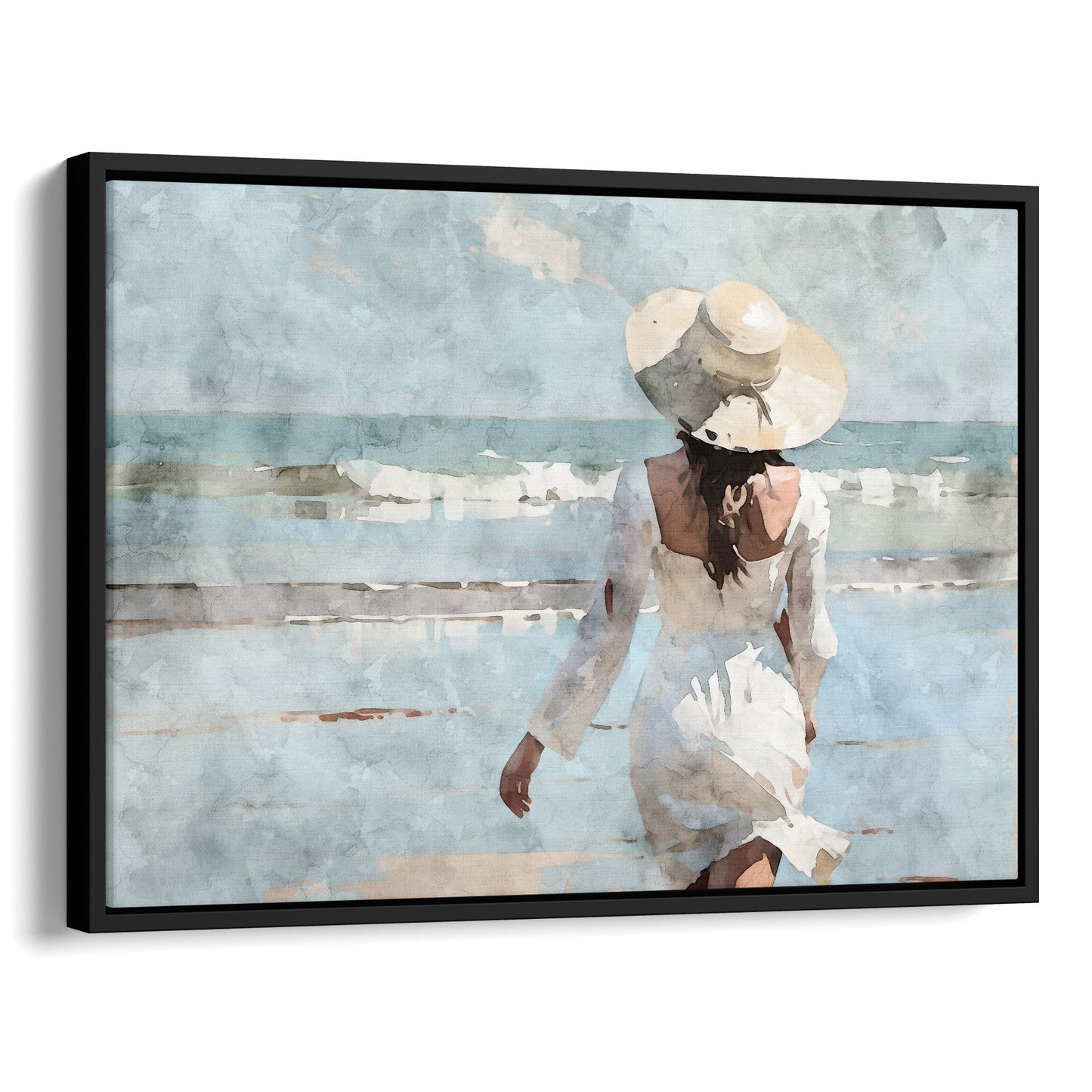 Watercolor painting of a woman in a white dress and wide-brimmed hat walking toward the ocean on a sandy beach, with waves in the background. Artwork printed on gallery wrap canvas in black floater frame.