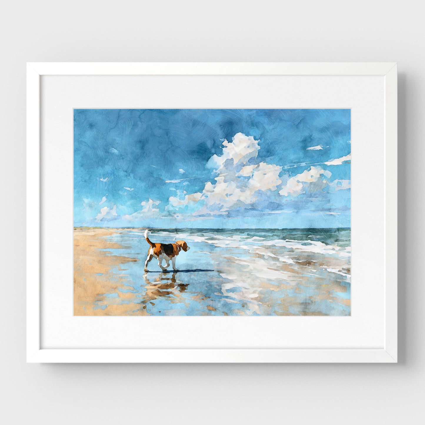 White framed and matted artwork of a beagle on a beach with a blue sky and clouds.