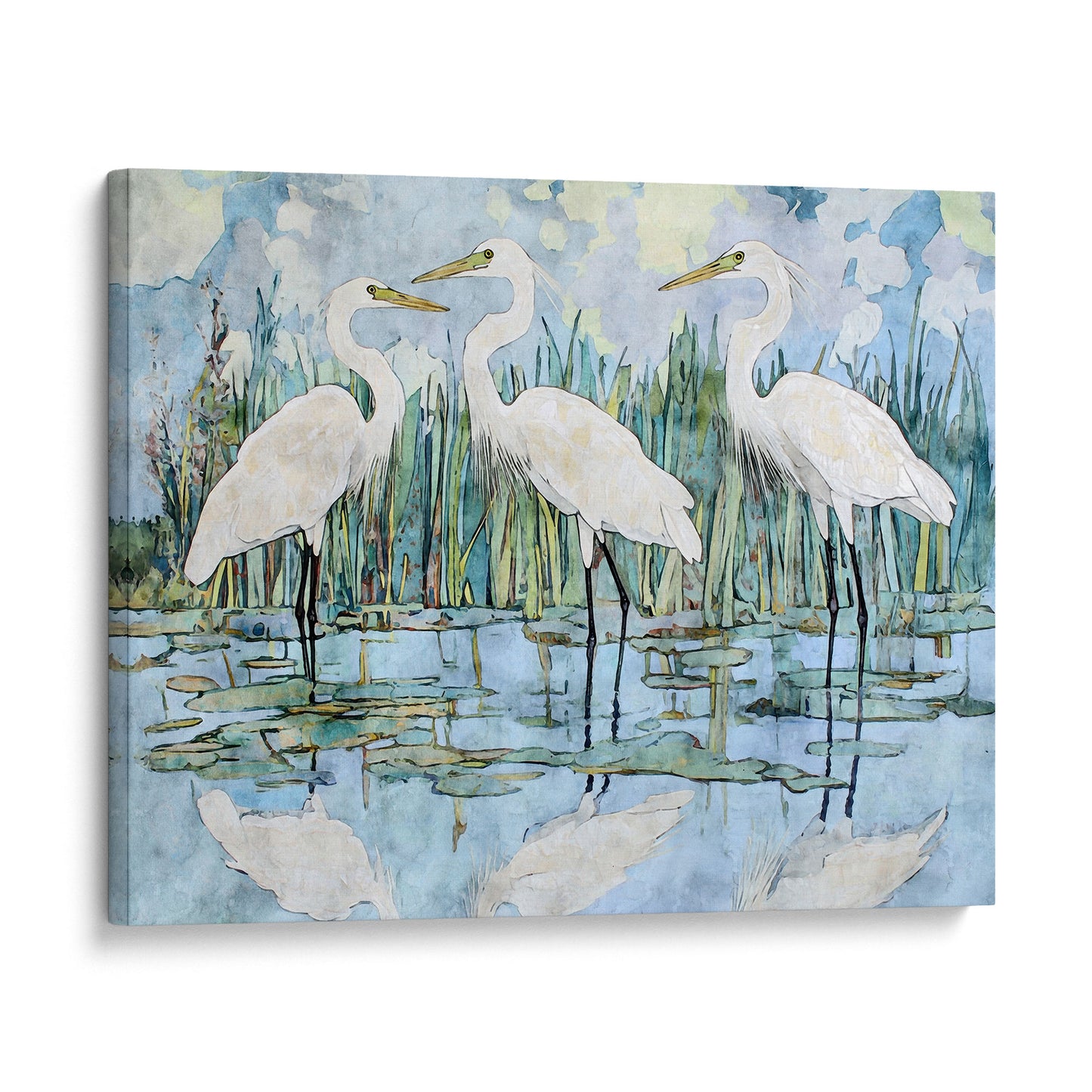 Canvas print of three white herons in a marshy area with water and reeds.