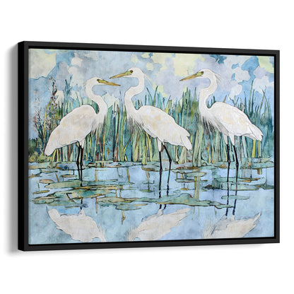Framed artwork of three white birds standing in water with a blue and green background.