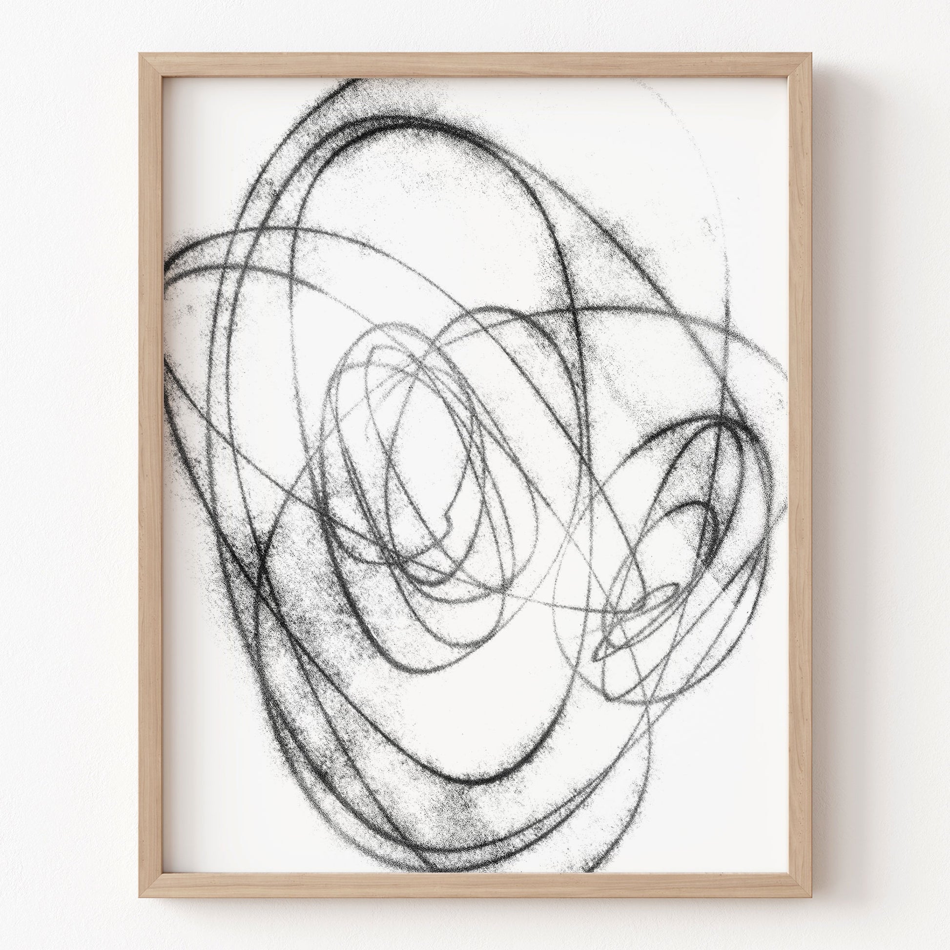 Framed abstract art with black lines on a white background