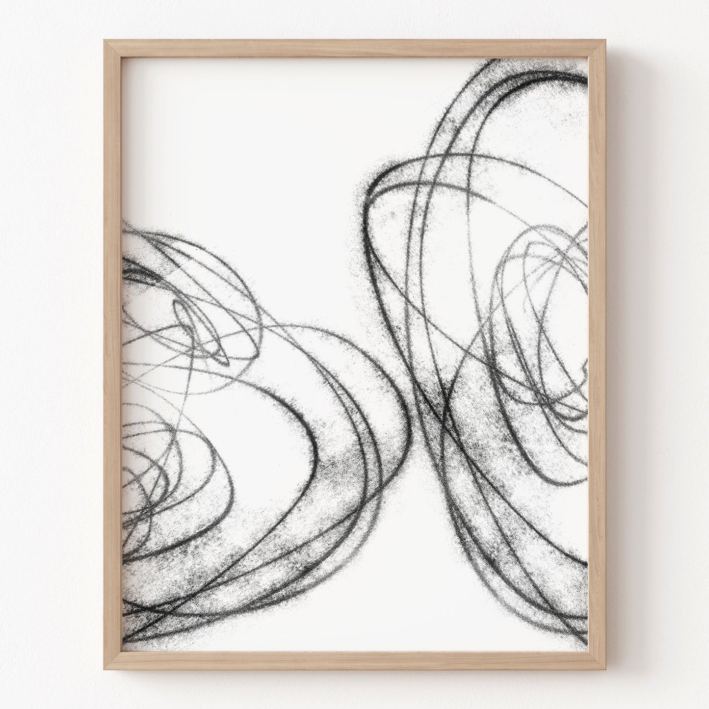 Framed abstract art print with black line drawings on a white background