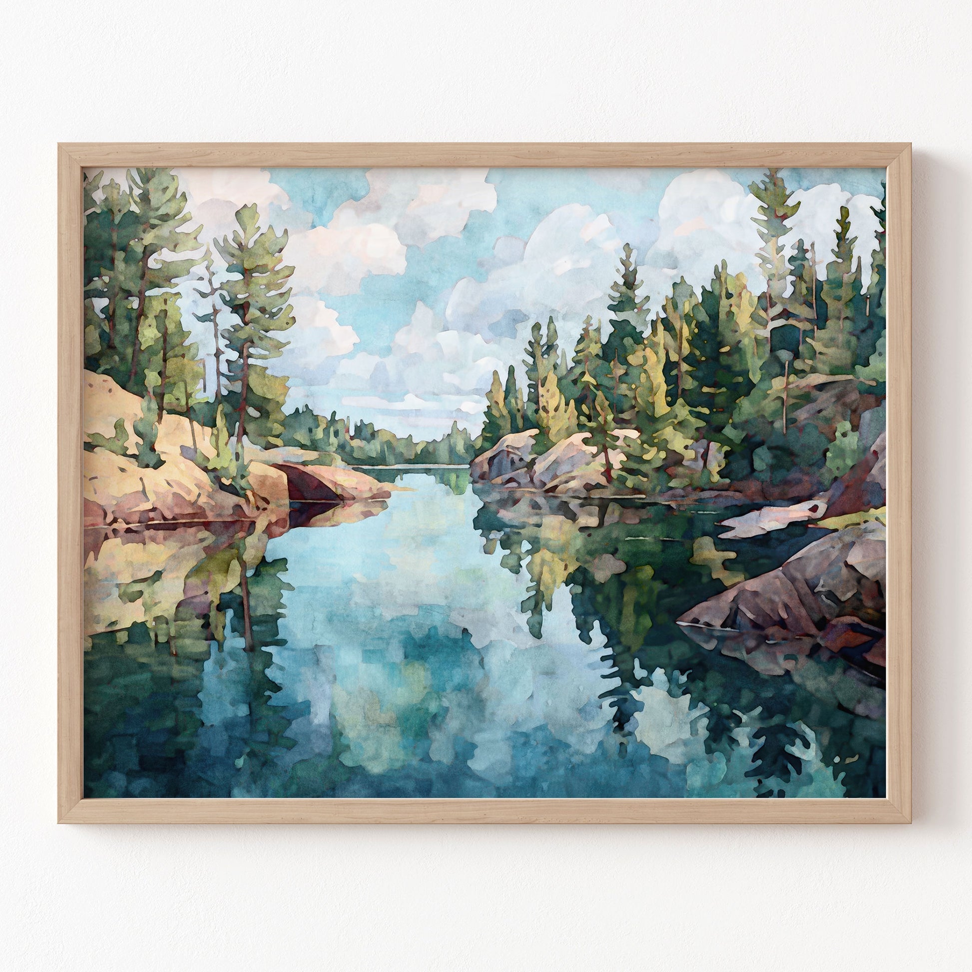 Framed painting of a serene lake surrounded by trees