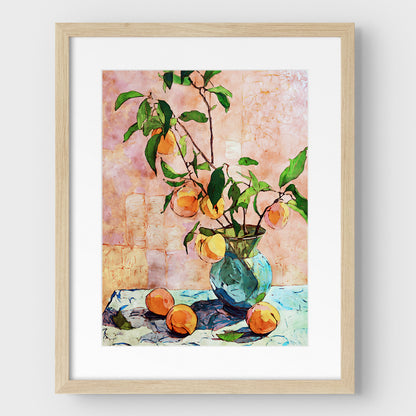 Framed artwork of a still life with peaches and leaves on a textured wall.