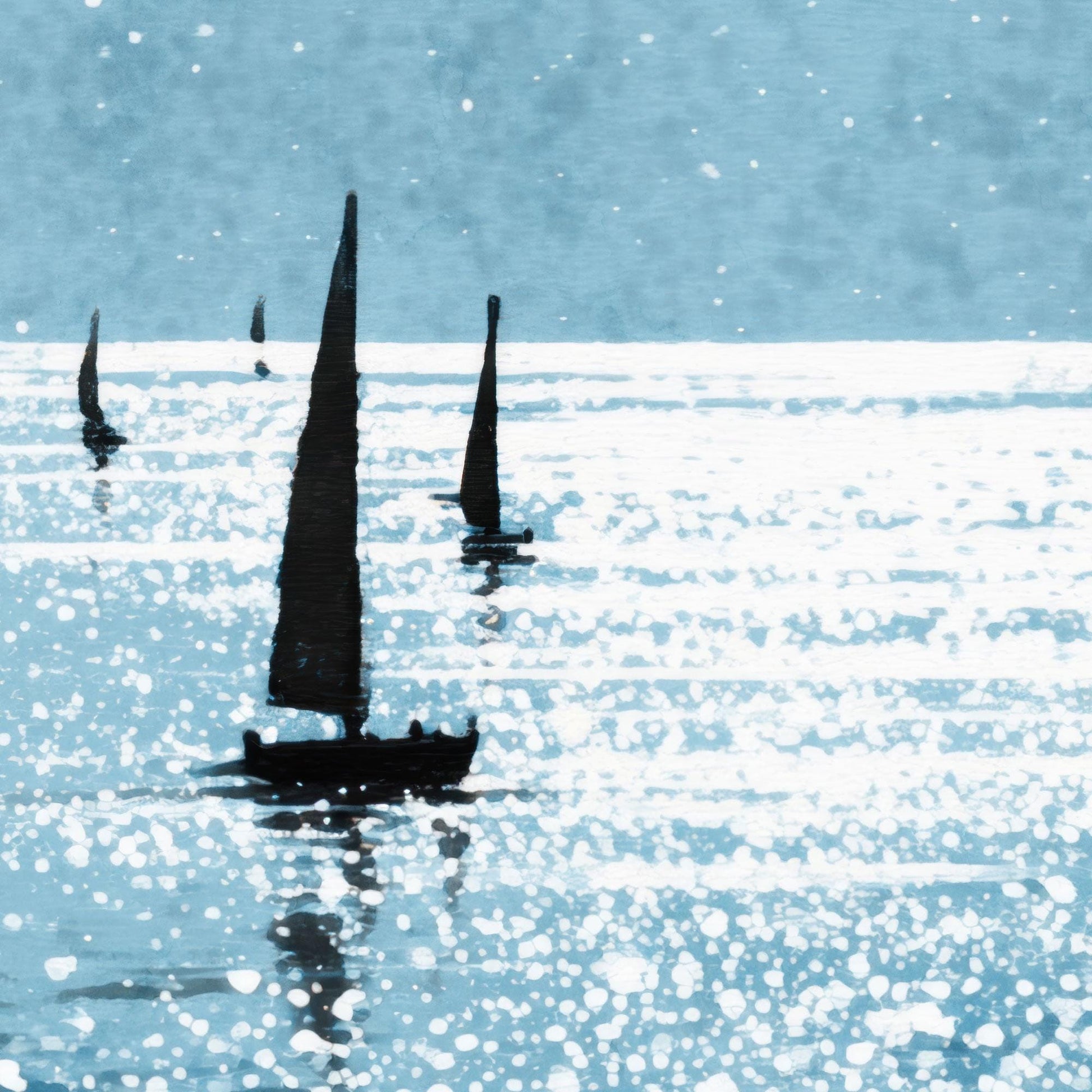 Painterly illustration of four sailboats with black sails gliding across shimmering blue water. The surface sparkles with sunlight, rendered in soft, splattered white highlights. The distant boats fade into a hazy blue horizon under a pale sky, evoking a dreamy, tranquil atmosphere.